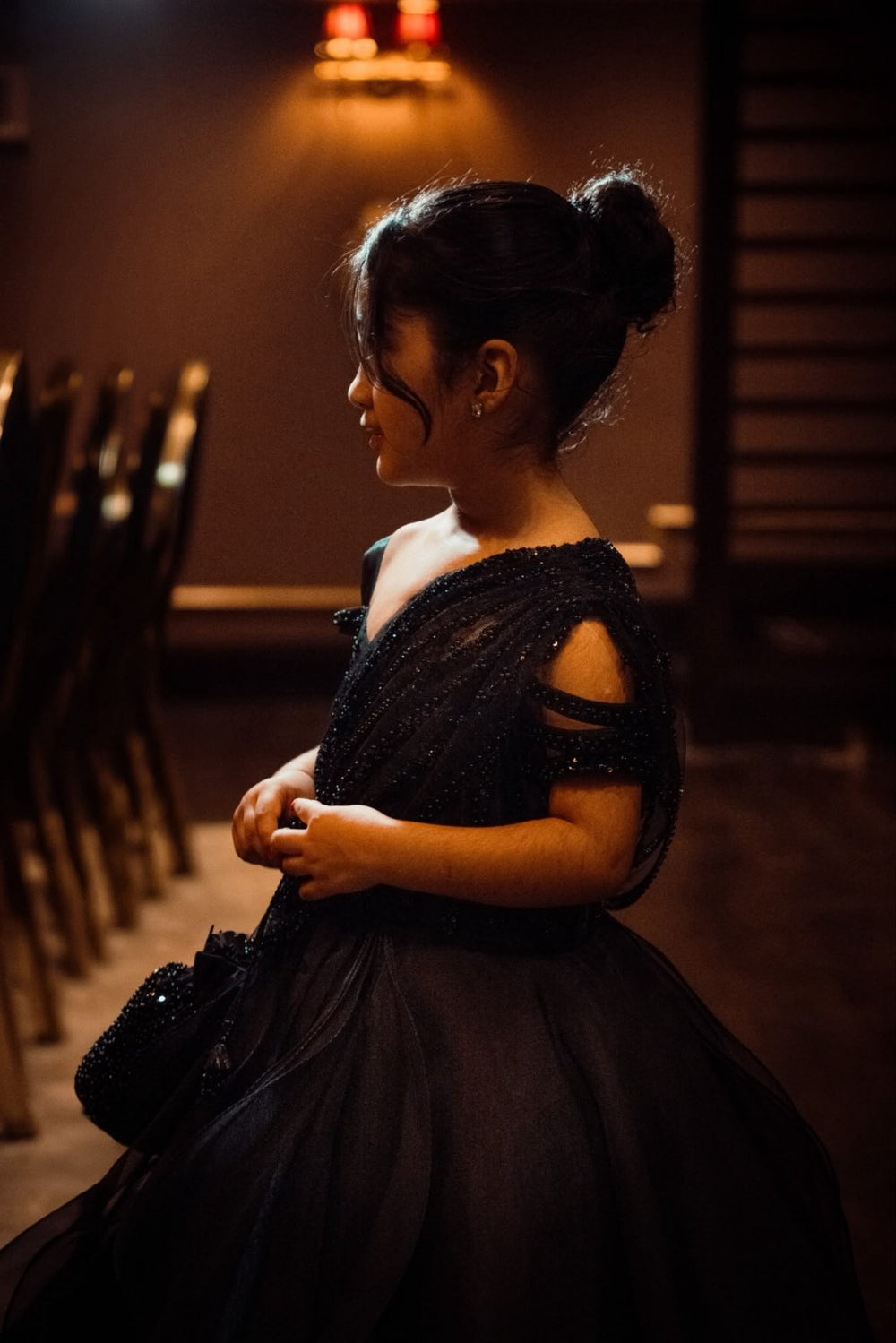 Portrait of Mehru wearing the Celeste gown, with delicate beaded detailing