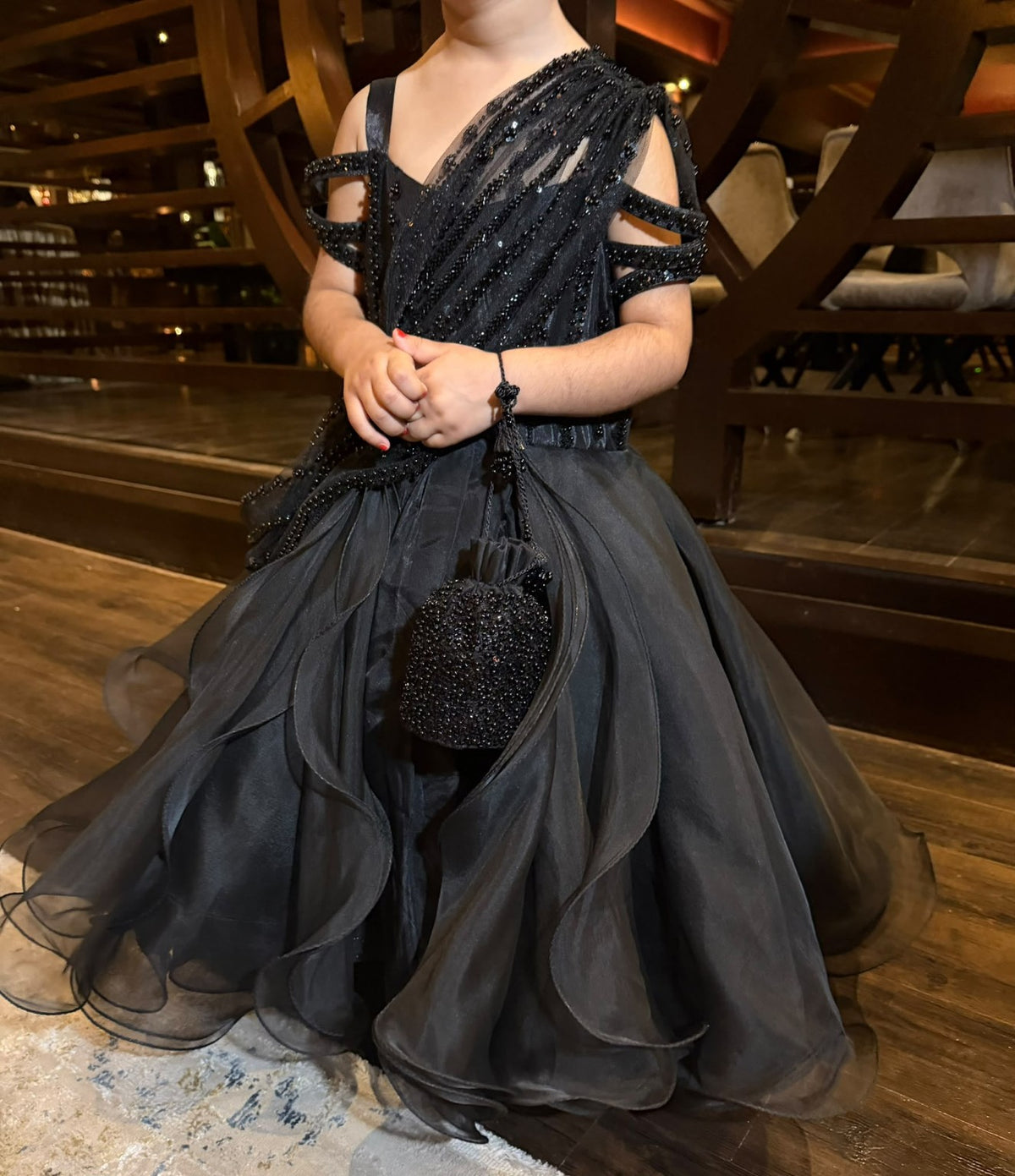 Celeste beaded bodice, sari-inspired drape and organza layers; styling pouch not included